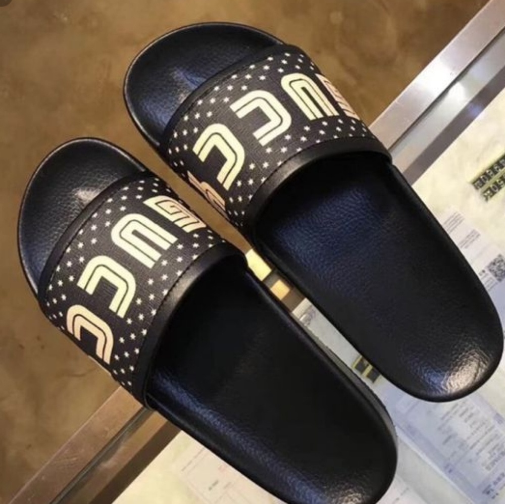 Gucci slides TRADE